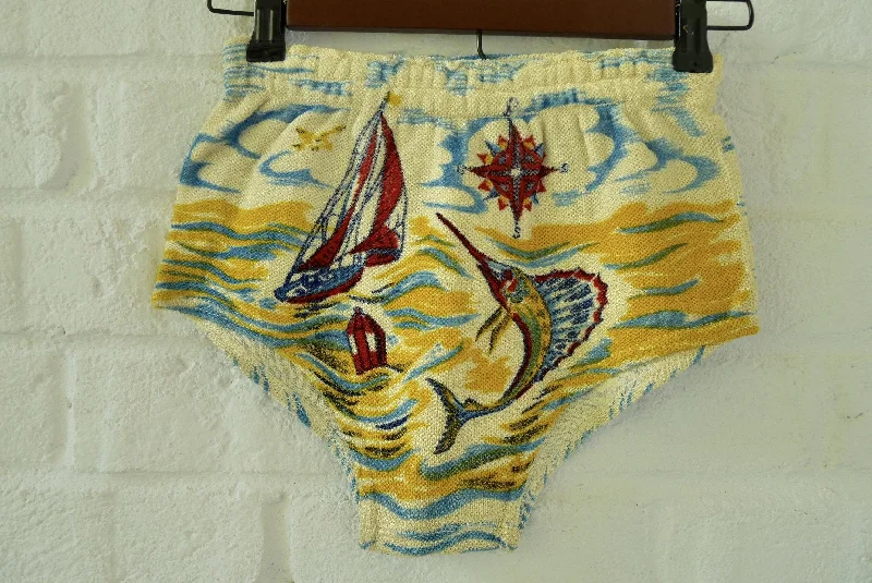 Rare 1930s boy swim trunk dead stock . Shark fish print New Year's Eve floral dresses